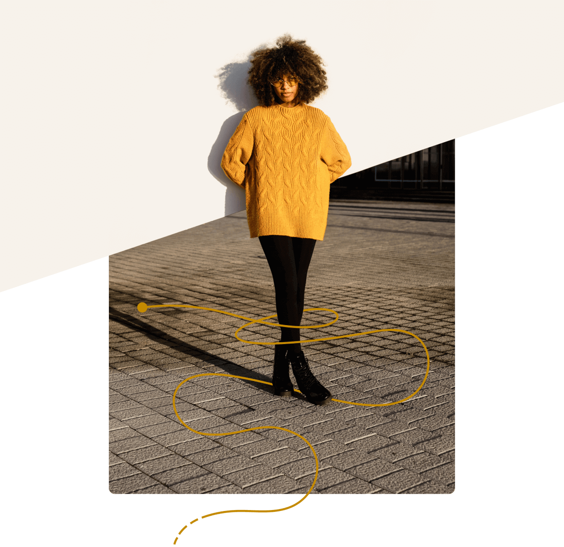 Gen-Z woman stands in yellow sweater ready to become a first-time homebuyer.